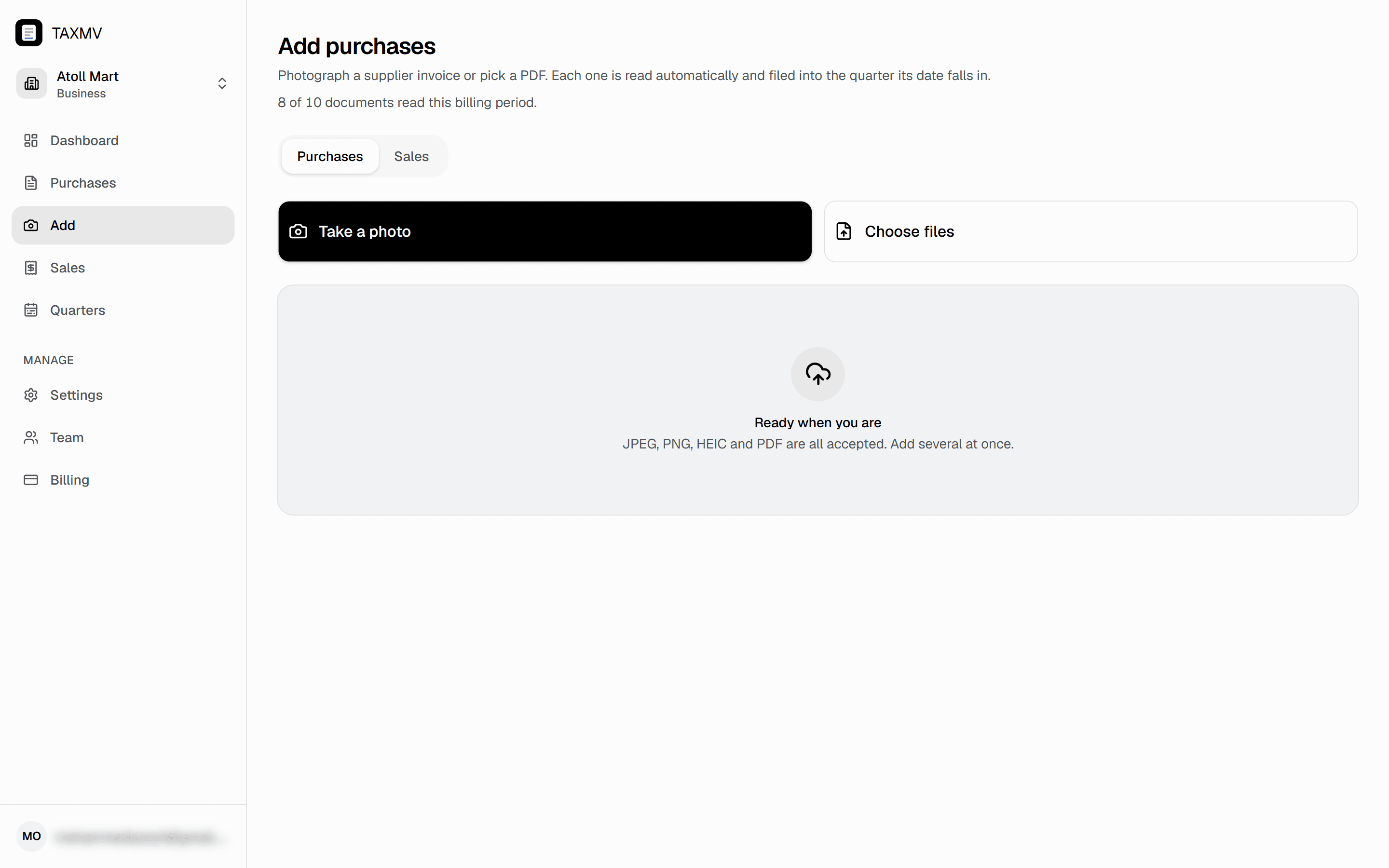 The add-documents page, showing the purchases and sales toggle above a drop zone for files, and a summary of where the last batch was filed.